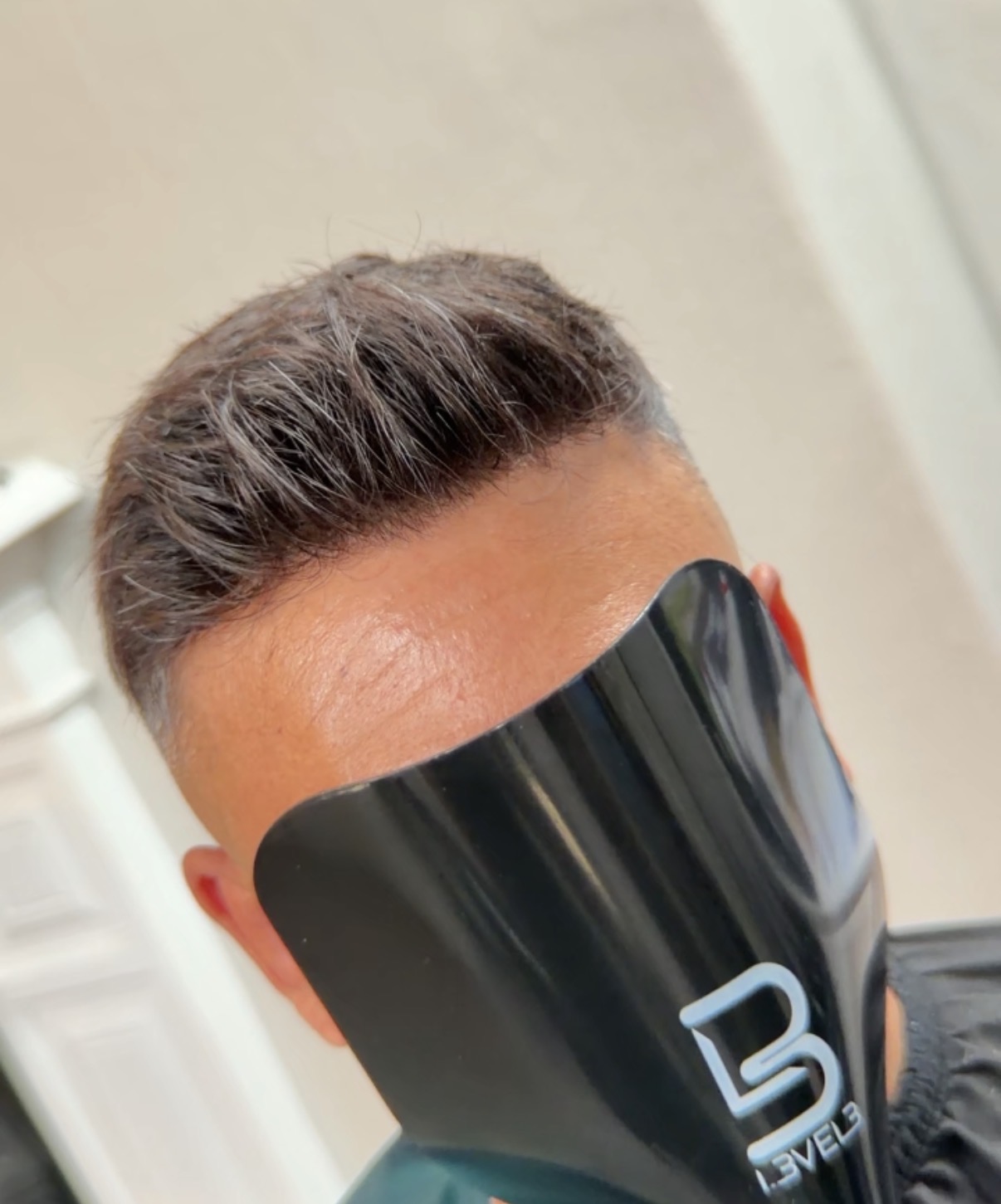 Close-up of the ultra-thin base and hairline on a hair system