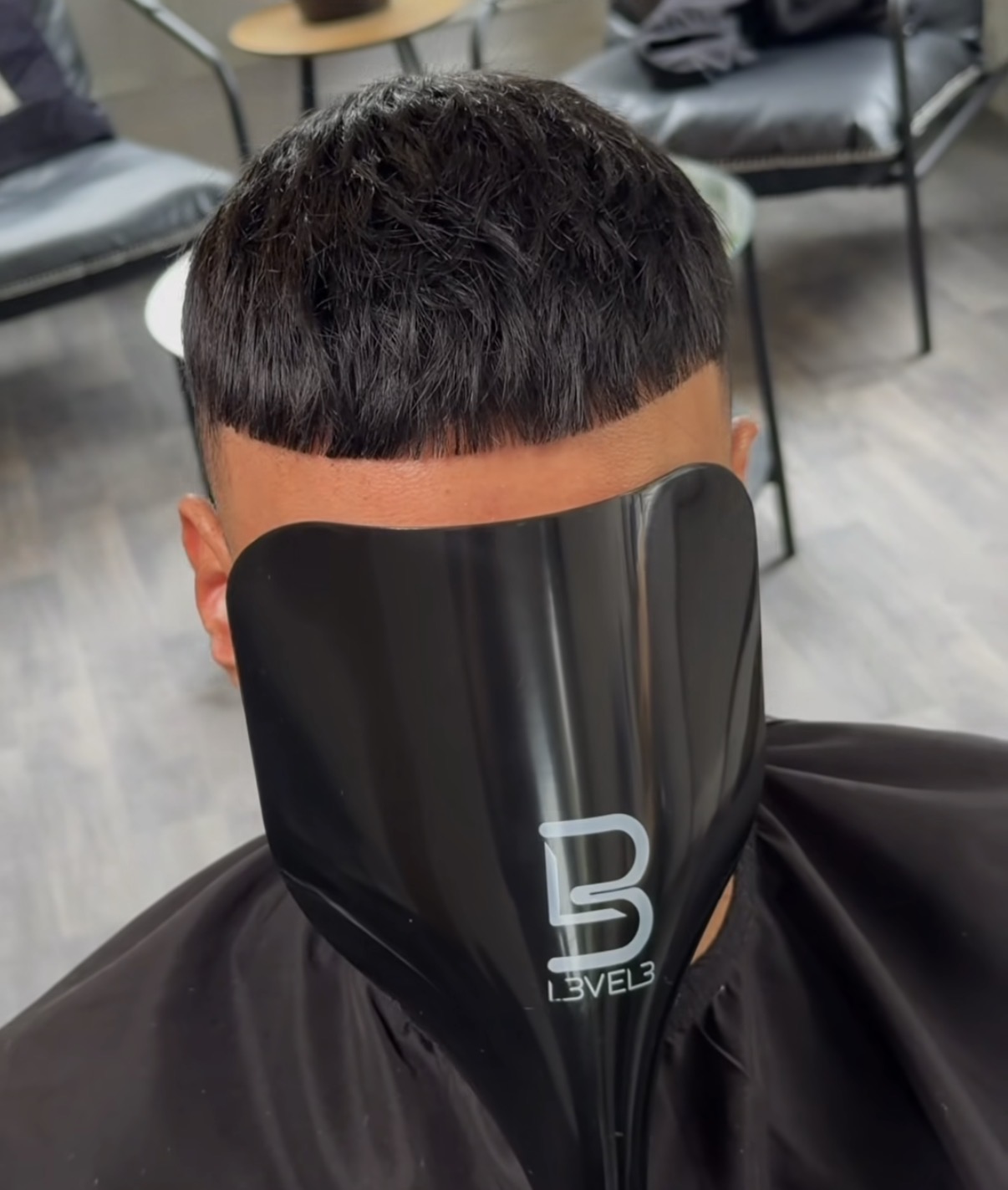 Close-up of a precision hair system cut and blend finished at Hair Repair Club